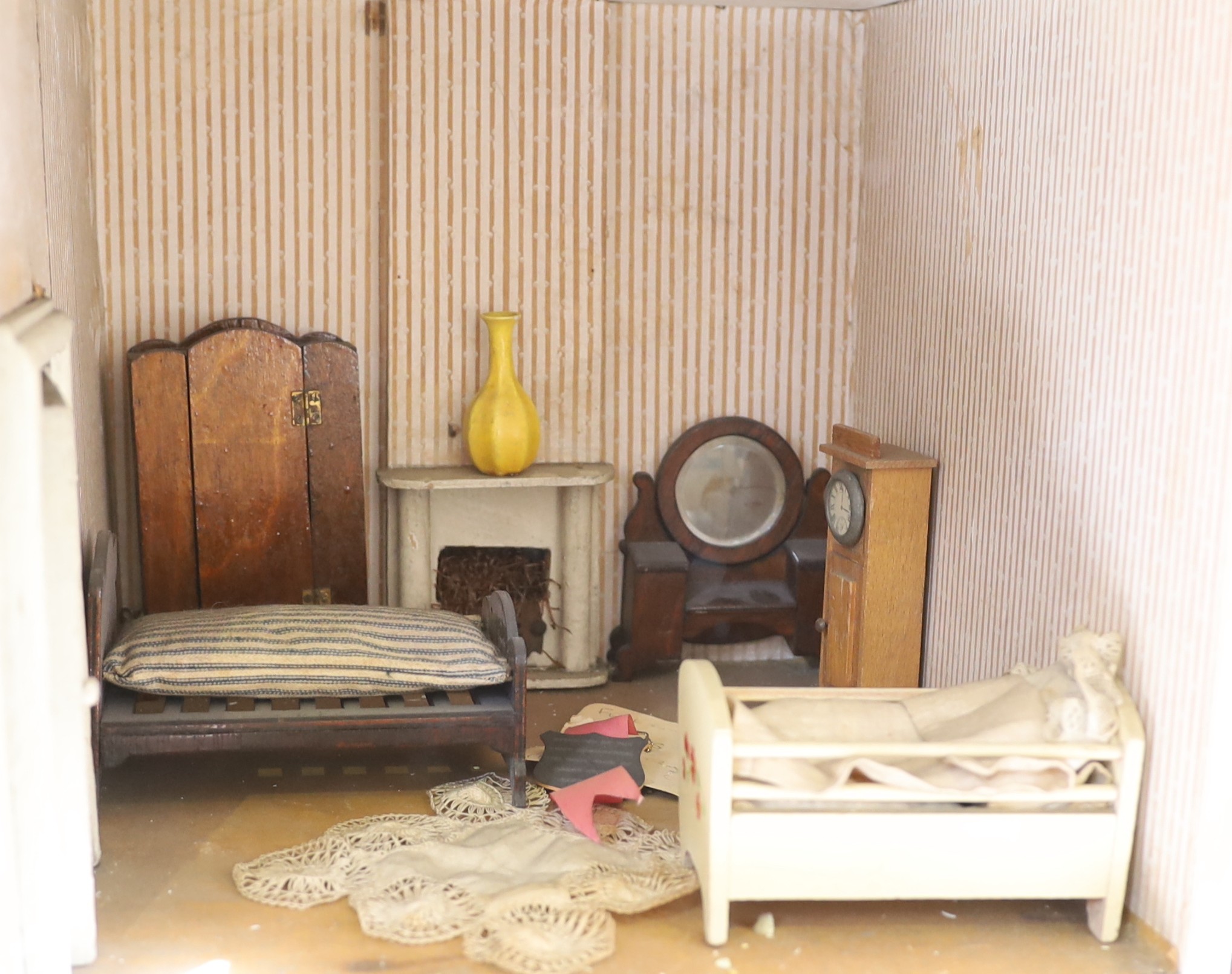 ‘Kits Coty House': An important G. & J. Lines furnished dolls’ house, dated 1912